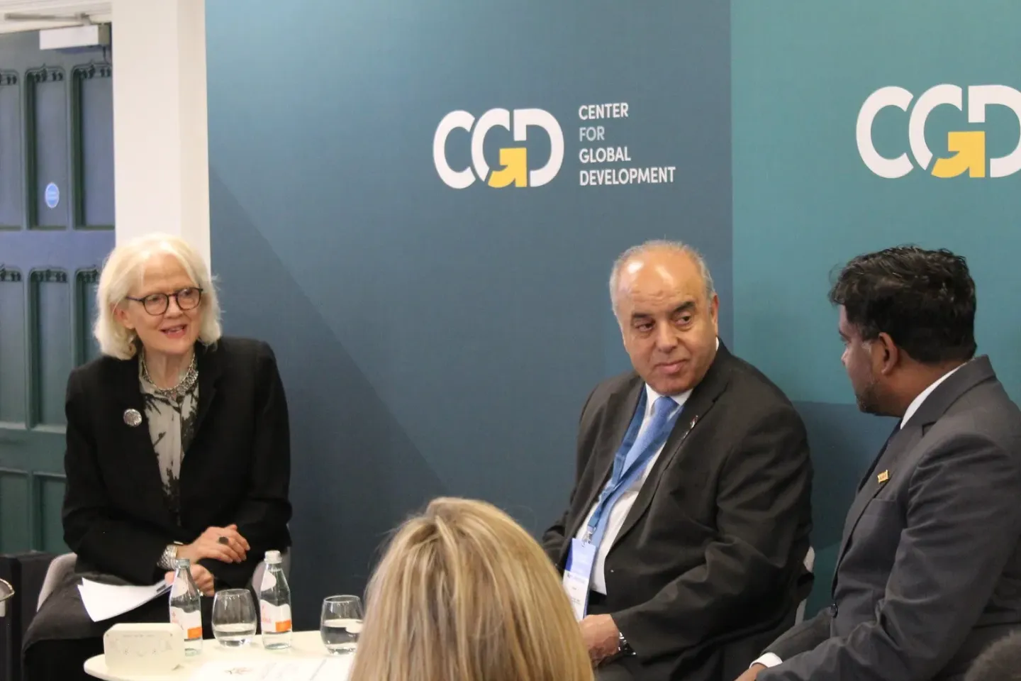 Panel of three speakers at event.