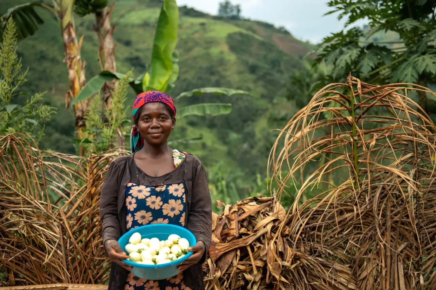 RAFIKI, 33 years old, mother of six children living in the Bunyakiri health zone located in the Kalehe territory in South Kivu after the eggplant harvest.