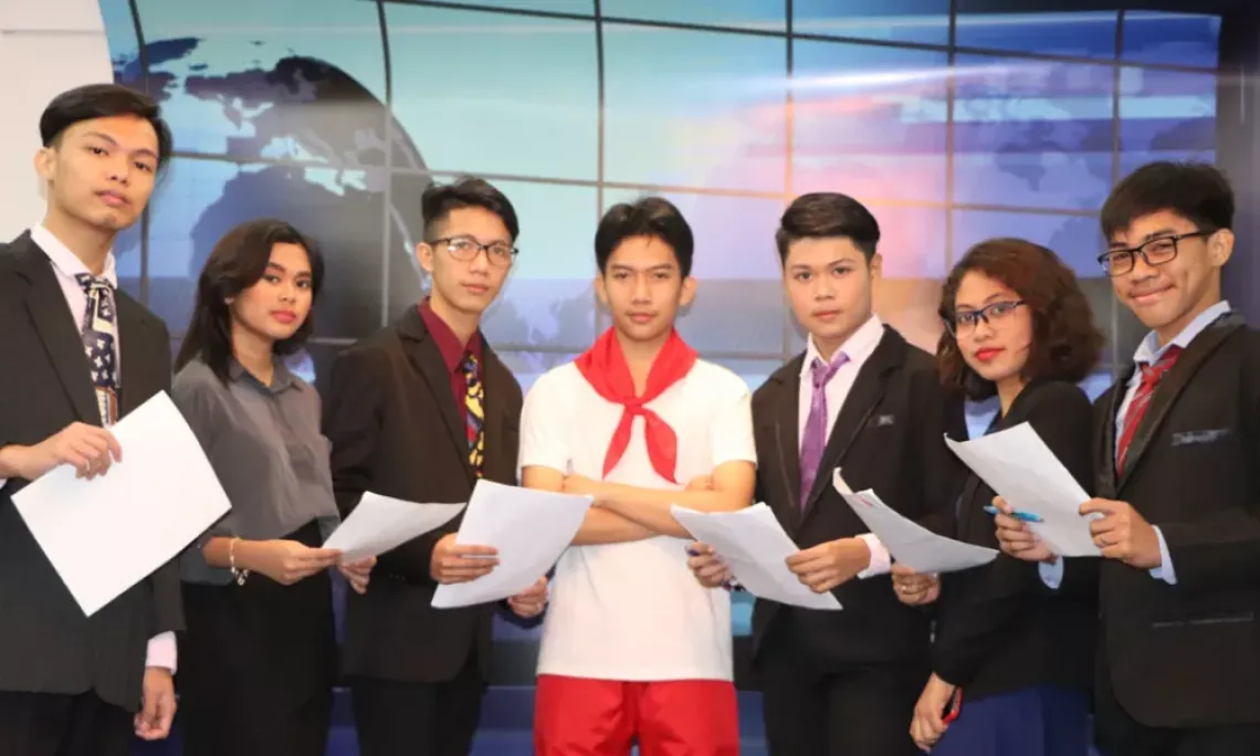 Ericka, second from left, speaks at the media and stakeholders' briefing for the Filipino Children's Report.